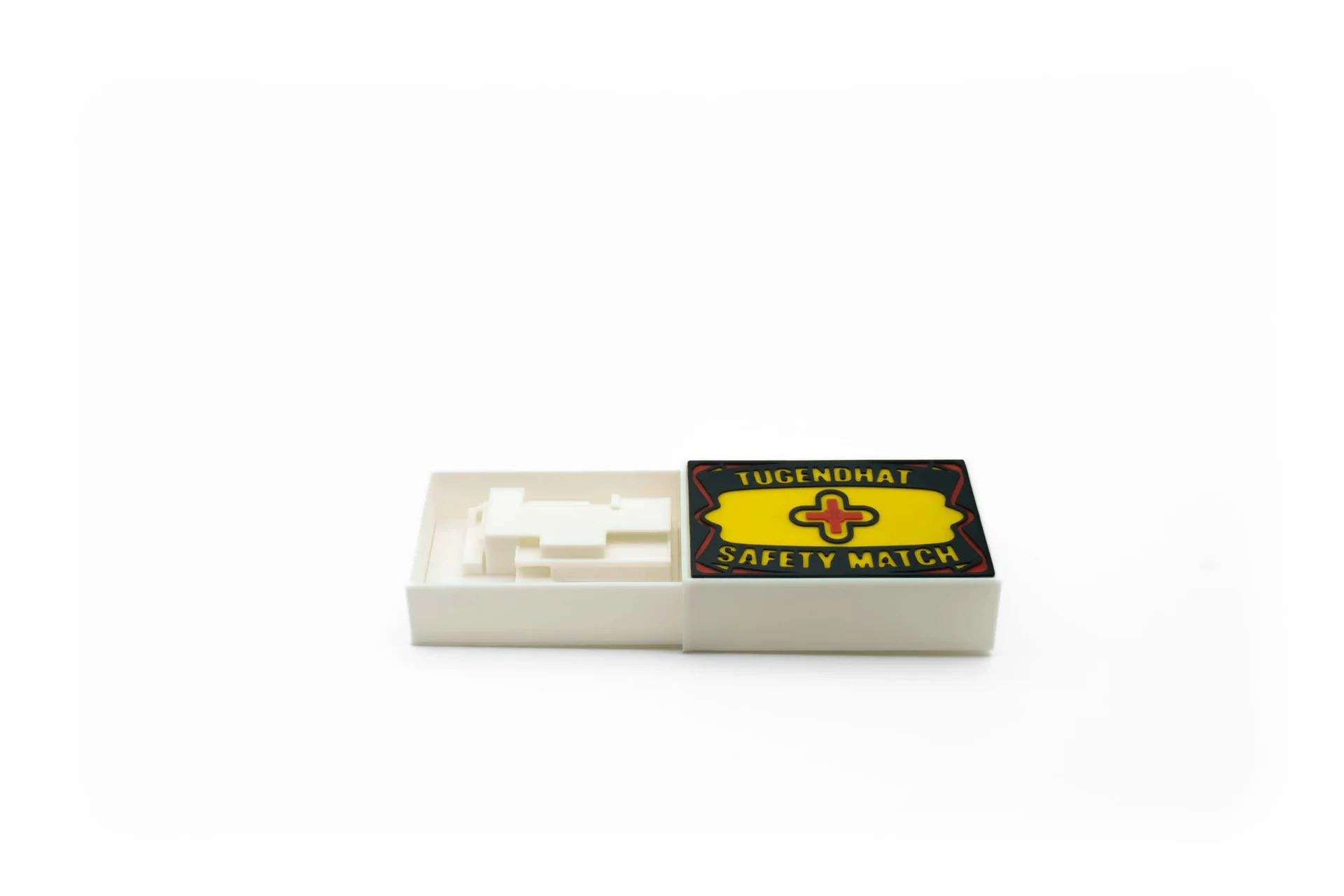 Miniatura vily Tugendhat ve vysunuté krabičce SAFETY MATCH